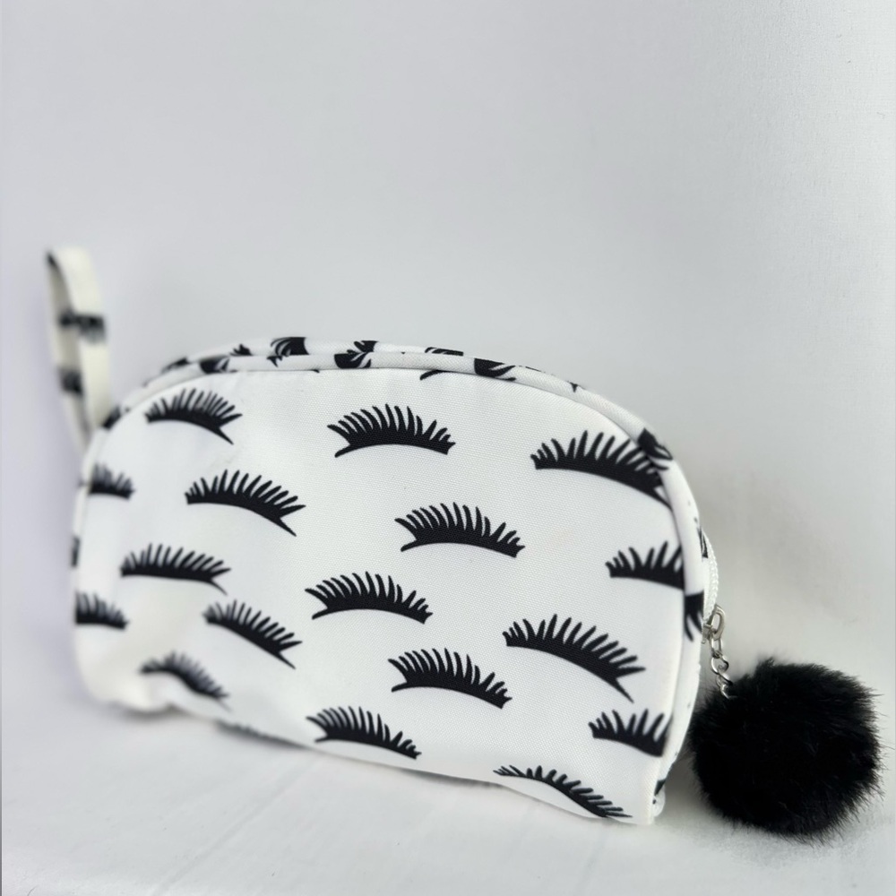 Makeup Bag, cosmetic travel bag - eyelash pattern with pompom zipper pull